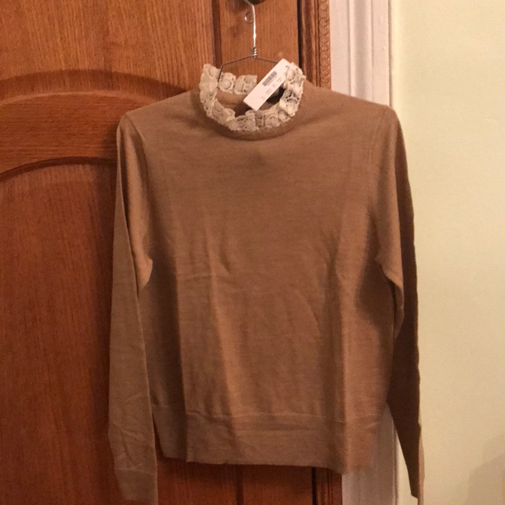 Light brown sweater with crotchet detailing